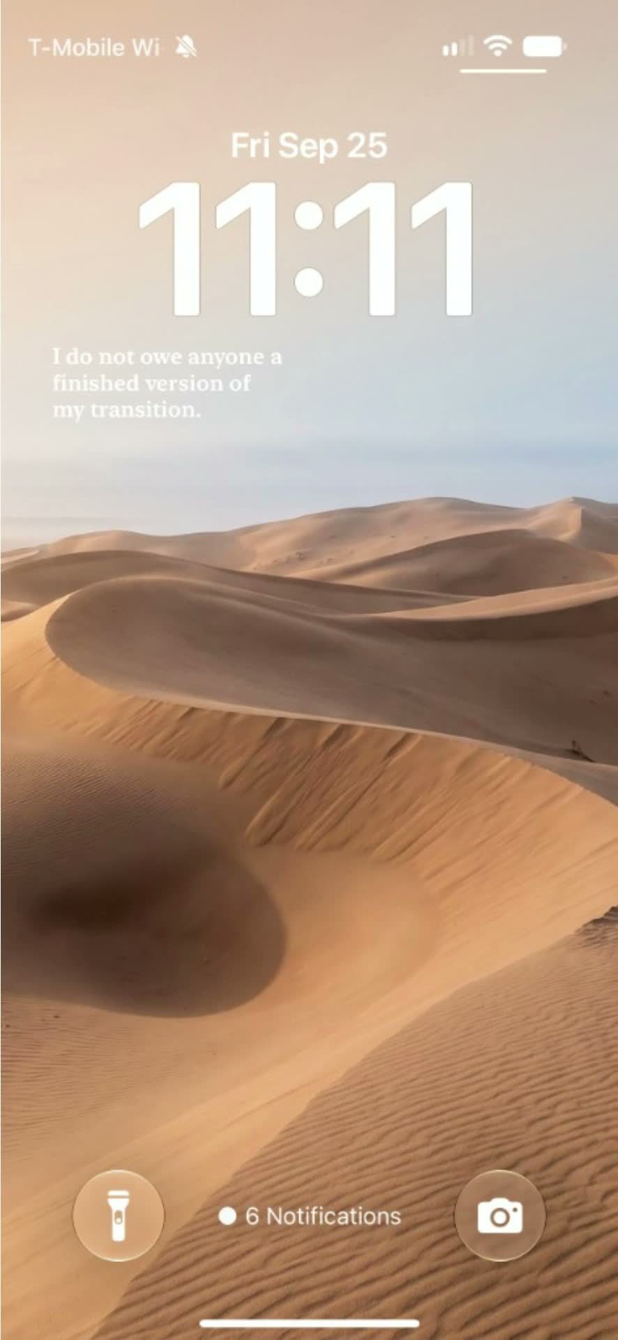 Lock Screen with today’s line over a desert.